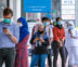 KUALA LUMPUR, MALAYSIA - MAY 04, 2020: People wearing a face mask while lining up with social distancing at the post office. Malaysia Coronavirus disease 2019 (COVID-19) outbreak.
