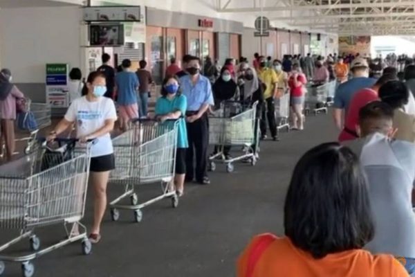 people-queue-outside-supermarket-after--total-lockdown--was-announced-amid-covid-19-surge--in-gelugor-1